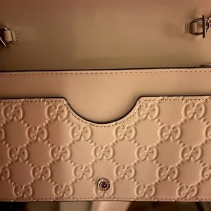 All white Gucci Crossbody bag use war three times